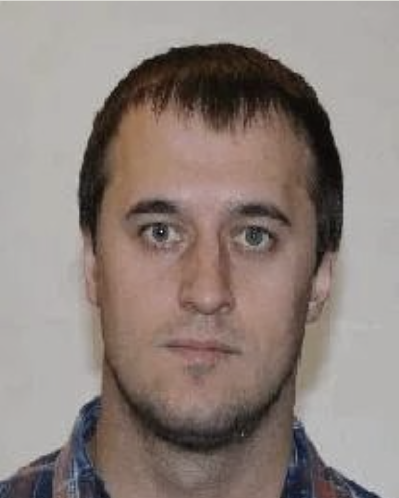 Зайферт Евгений — портрет в клетчатой рубашке на светлом фоне